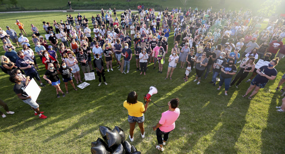 A candlelight vigil begins at the Bee Branch Creek area in Dubuque, Iowa, on June 5. A silent march and the candlelight vigil were held in response to the May 25 death of George Floyd and in remembrance of others who have suffered from police brutality. (Photo: Nicki Kohl/Telegraph Herald via Associated Press)