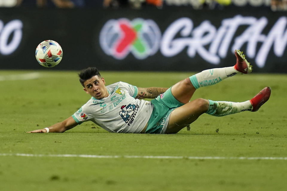 Club Leon's Santiago Colombatto knocks the ball out of the air against the Seattle Sounders during the first half of the Leagues Cup soccer final Wednesday, Sept. 22, 2021, in Las Vegas. (AP Photo/John Locher)