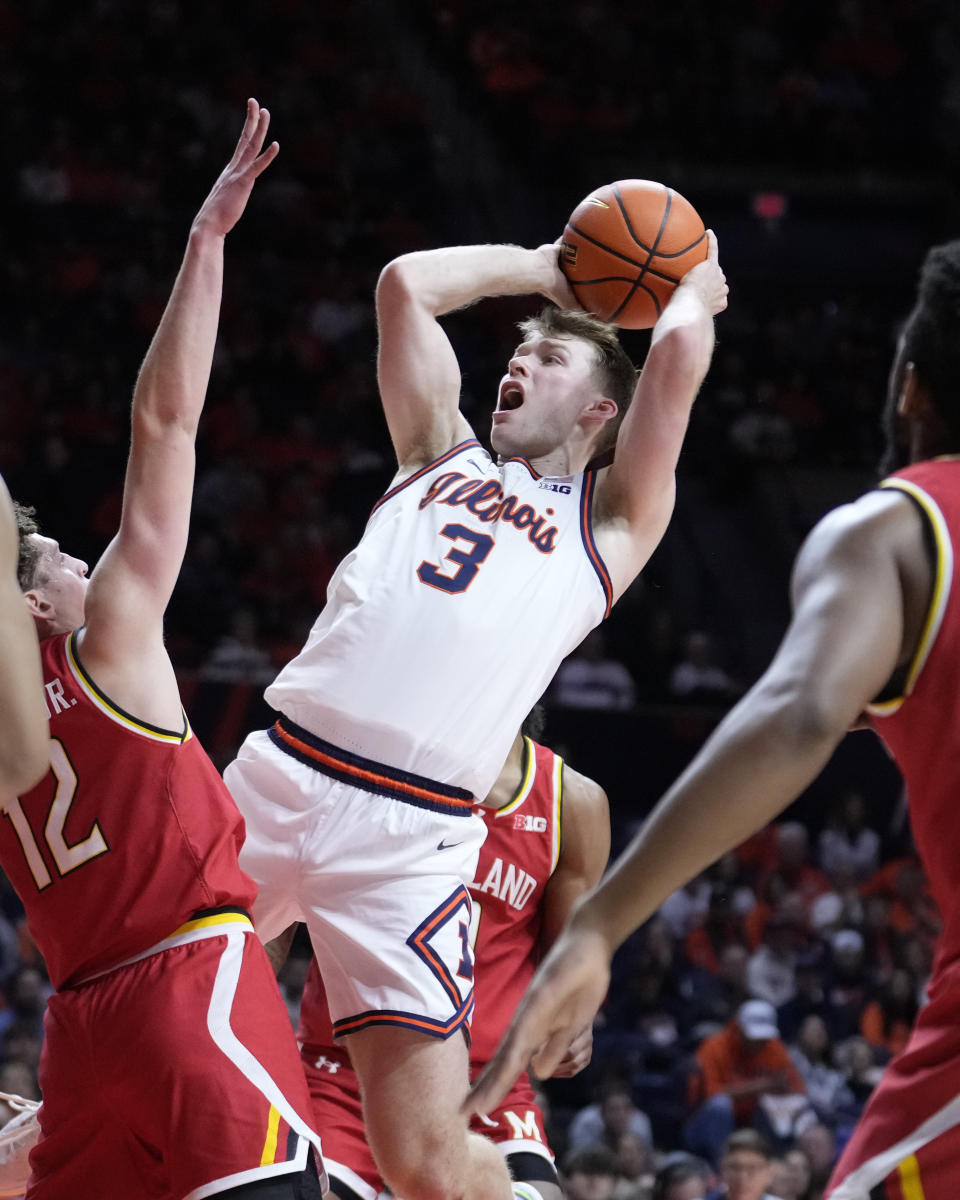 FILE - Illinois' Marcus Domask shoots during an NCAA college basketball game against Maryland Sunday, Jan. 14, 2024, in Champaign, Ill. Domask is the newcomer of the year on the AP All-Big team in voting released Tuesday, March 12, 2024. (AP Photo/Charles Rex Arbogast)