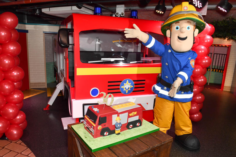 EDITORIAL USE ONLY Fireman Sam celebrates his 30th anniversary at a special birthday party held at Mattel Play! Liverpool at the Albert Dock.