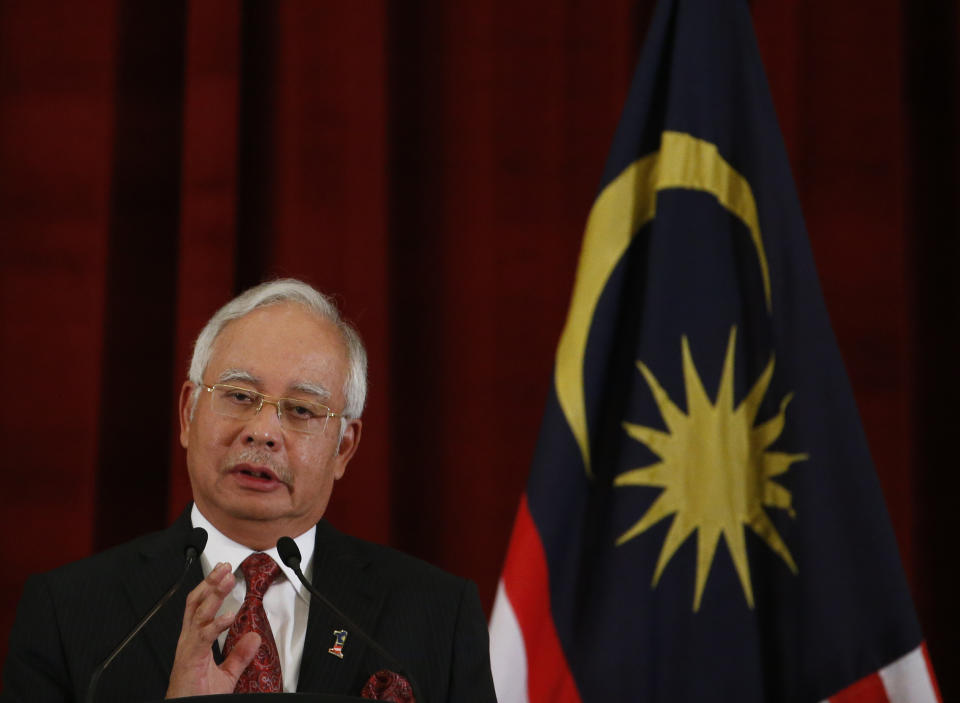 Malaysian Prime Minister Najib Razak answers a question during a joint news conference with U.S. President Barack Obama at his residence in Kuala Lumpur, Malaysia, Sunday, April 27, 2014. Opening the first visit to Malaysia by a U.S. president in nearly half a century, Obama holds economic and security talks with Razak, who leads a southeast Asian nation with an important role in Obama's efforts to forge deeper ties with the region. (AP Photo/Charles Dharapak)