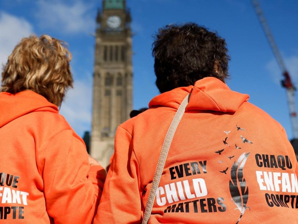 People gather on Parliament Hill for Canada's first National Day for Truth and Reconciliation in 2021. (Blair Gable/Reuters - image credit)