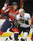 <p>Washington Capitals winger Alex Ovechkin (8) hits Pittsburgh Penguins center Sidney Crosby (87), after Crosby took a shot at the Capitals goal, in the first period at the Verizon Center in Washington, D.C., Sunday, February 3, 2013. (Chuck Myers/MCT via Getty Images) </p>