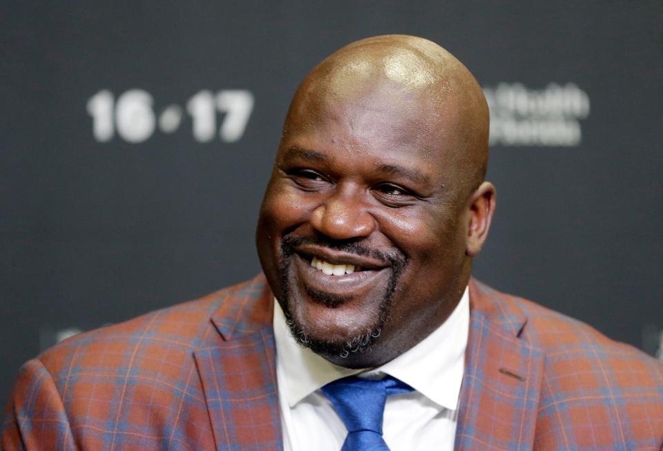 FILE - In this Dec. 22, 2016, file photo, retired Hall of Fame basketball player Shaquille O'Neal smiles as he talks to reporters during an NBA basketball news conference in Miami. O’Neal has been to enough parties before Super Bowls to know that he can do much better. “I’ve been to a million Super Bowl parties the past 15 years, and they’re all boring,” O’Neal said. “So this is Atlanta, I’m bringing the party to Atlanta. I wanted to do something big, so I called my friends.” (AP Photo/Alan Diaz, File)
