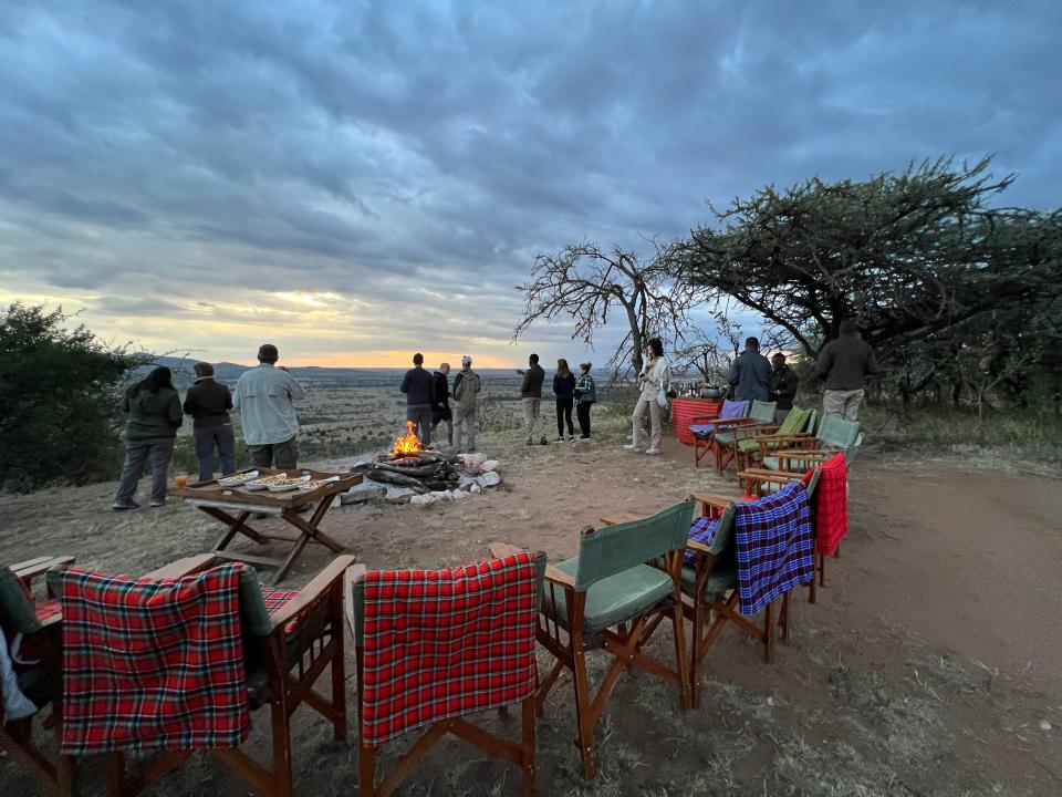 Chairs set up around firepit for Tassa farewell dinner