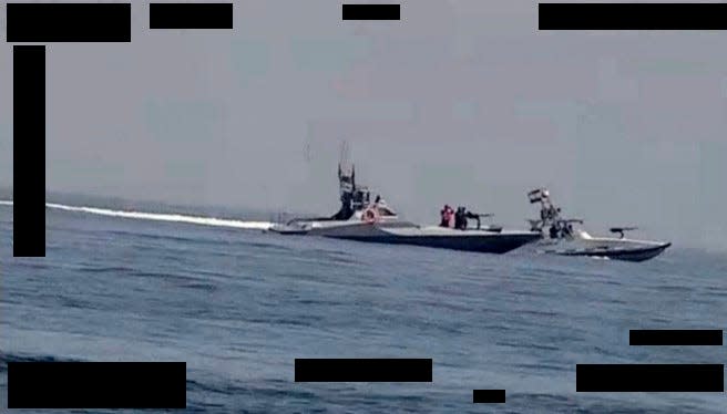 An undated still image released on Oct. 6 from video taken by an Arabian Fox MAST-13 unmanned surface vessel of two Islamic Revolutionary Guard Corps Navy patrol speedboats in the Strait of Hormuz.