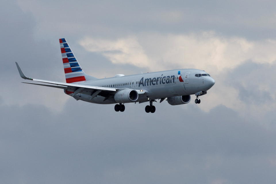 An American Airlines commercial aircraft approaches to land at John Wayne Airport in Santa Ana, California U.S. January 18, 2022. REUTERS/Mike Blake