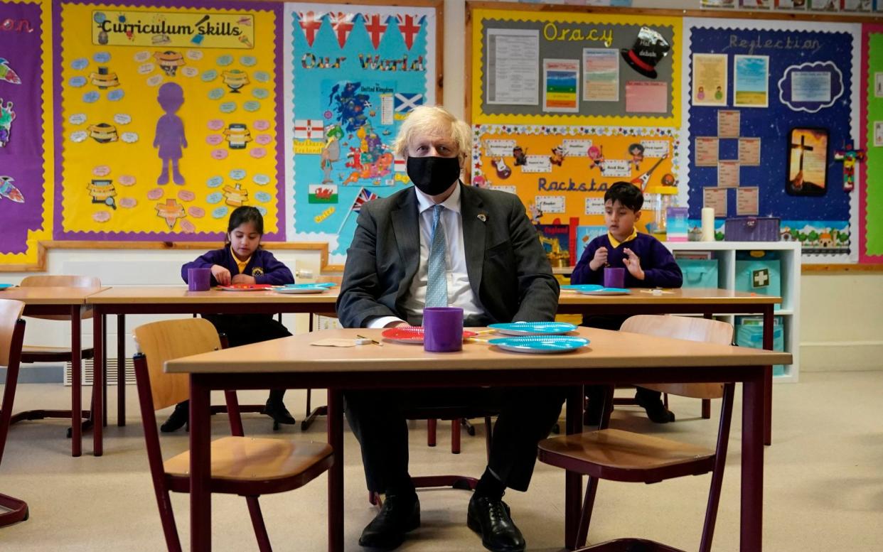 Prime Minister Boris Johnson joins a Year 2 maths lesson during a visit to St Mary's CE Primary School in Stoke-on-Trent, Staffordshire, to see how they are preparing for students to return. Picture date: Monday March 1, 2021. PA Photo. See PA story HEALTH Coronavirus. Photo credit should read: Christopher Furlong/PA Wire - Christopher Furlong/PA Wire