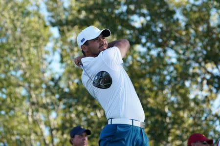 Sep 28, 2017; Jersey City, NJ, USA; Jason Day tees off on the twelfth hole during the first round foursomes match of The President's Cup golf tournament at Liberty National Golf Course. Mandatory Credit: Kyle Terada-USA TODAY Sports