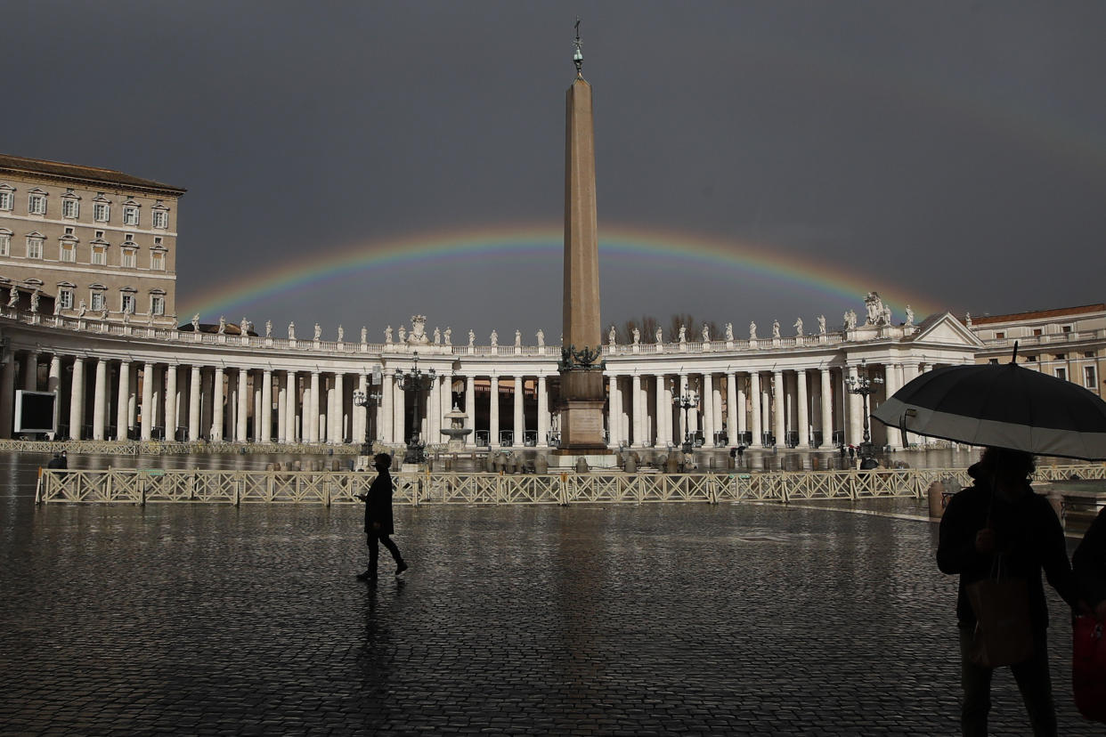 FILE - A rainbow shines over St.Peter's Square at the Vatican, on Jan. 31, 2021. In an interview with The Associated Press at The Vatican, Tuesday, Jan. 24, 2023, Pope Francis acknowledged that Catholic bishops in some parts of the world support laws that criminalize homosexuality or discriminate against the LGBTQ community, and he himself referred to homosexuality in terms of "sin." But he attributed attitudes to cultural backgrounds and said bishops in particular need to undergo a process of change to recognize the dignity of everyone. (AP Photo/Alessandra Tarantino, file)