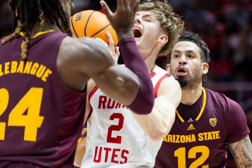 Utah Utes guard Cole Bajema (2) yells as he is blocked by Arizona Sun Devils forward Bryant Selebangue (24) at the Huntsman Center in Salt Lake City on Saturday, Feb. 10, 2023. | Marielle Scott, Deseret News