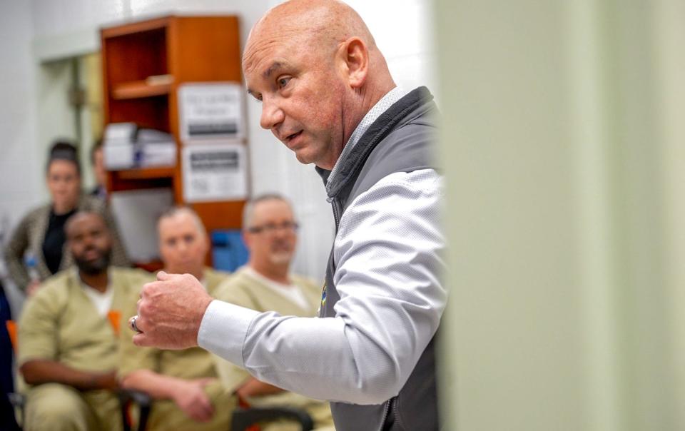 Acting Rhode Island Corrections Director Wayne T. Salisbury Jr. encourages a coding class at the ACI to make the most out of the program.