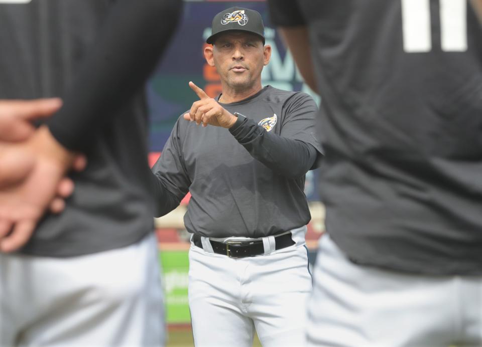 RubberDucks manager Rouglas Odor talks to his team Tuesday, April 4, 2023.