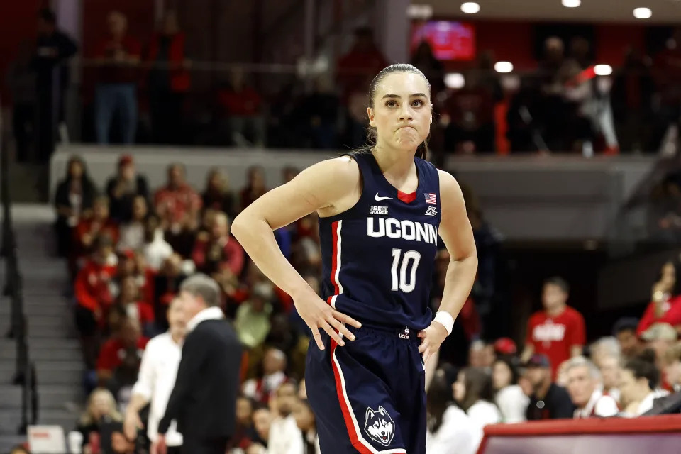 UConn's Nika Muhl (10) reacts during the second half of an NCAA college basketball game against North Carolina State, Sunday, Nov. 12, 2023, in Raleigh, N.C. (AP Photo/Karl B. DeBlaker)