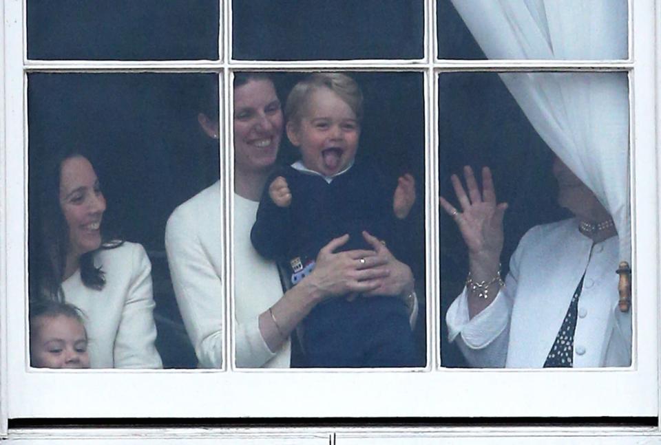 Prince George of Cambridge is held by his nanny Maria Teresa Turrion Borrallo as he waves from the window of Buckingham Palace as he watches the Trooping The Colour ceremony on June 13, 2015 in London, England. The ceremony is Queen Elizabeth II's annual birthday parade and dates back to the time of Charles II in the 17th Century, when the Colours of a regiment were used as a rallying point in battle.