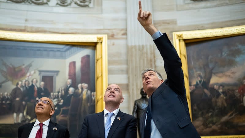 Rep. Darin LaHood, R-Ill., right, gives FIFA President Gianni Infantino, center, a tour of the U.S. Capitol Rotunda, in Washington, D.C., on Tuesday, April 30, 2024.