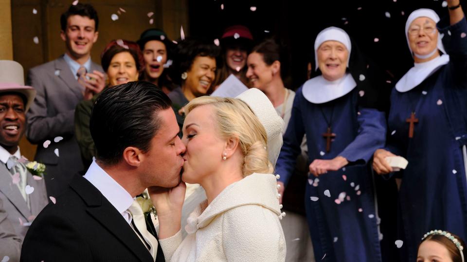 Nurse Trixie Franklin kisses Matthew on their wedding day outside the church