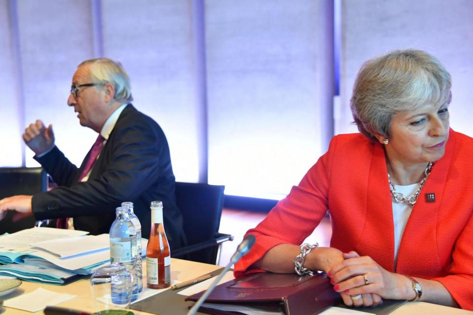 Theresa May and president of the European Commission Jean-Claude Juncker (AFP/Getty Images)