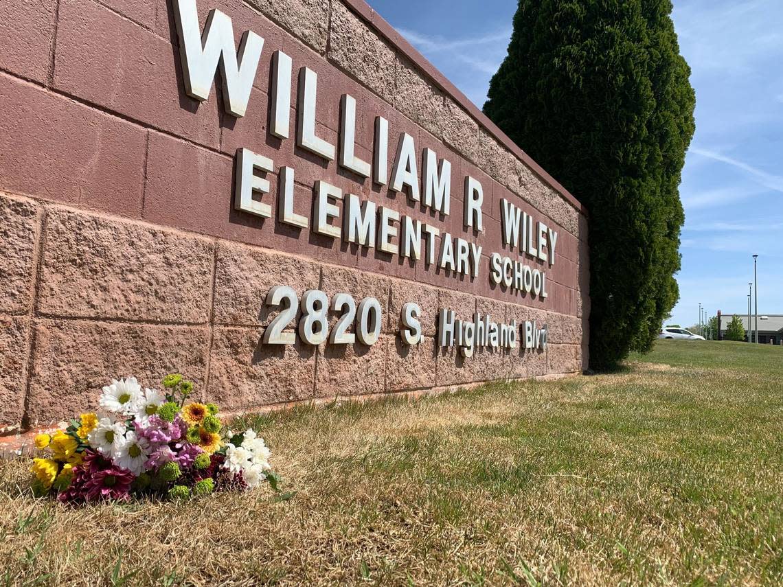 Flowers were placed at William Wiley Elementary School in West Richland, Wash., after paraeducator Amber M. Rodriguez was shot outside the school.