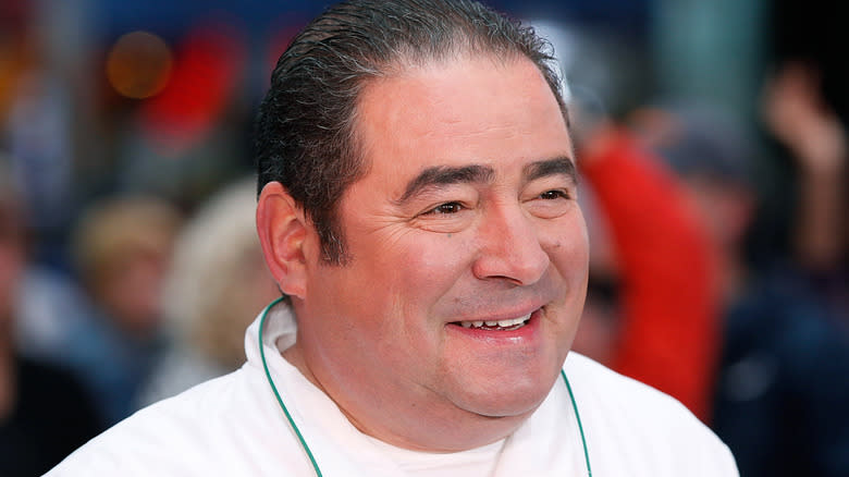 emeril lagasse smiling on the menu