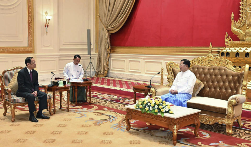 FILE - In this photo provided by the Myanmar Military True News Information Team, Min Aung Hlaing, the head of ruling military council, talks with Alounkeo Kittikhoun, left, special envoy for the Association of Southeast Asian Nations (ASEAN) during their meeting on Jan. 10, 2024, in Naypyitaw, Myanmar. Simmering tensions in the South China Sea between China and several Southeast Asian nations now regularly spark direct confrontation, while coordinated attacks on the military-run government that seized control of Myanmar three years ago have grown to the point that most say the country is now in a civil war. It's with this backdrop that Laos, the poorest and one of the smallest countries in the Association of Southeast Asian Nations, is taking over as the bloc's rotating chair. (Myanmar Military True News Information Team via AP)