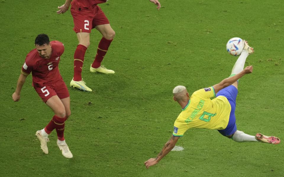 Richarlison (9) of Brazil in action against Strahinja PavloviÃ„ (2) and MiloÃ…Â¡ VeljkoviÃ„ (5) of Serbia during the FIFA World Cup Qatar 2022 Group G match between Brazil and Serbia at Lusail Stadium in Lusail City, Qatar on November 24, 2022 - Fareed Kotb/Anadolu Agency via Getty Image