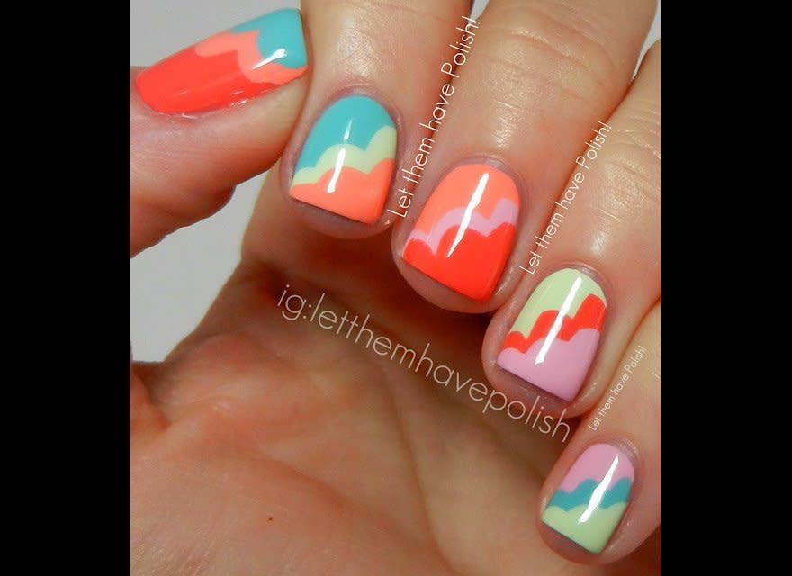 "I had to counter the rainy weather with some Sunny nails so I went with an Art Deco inspired manicure using Five Colors by Barielle. These colors are from the Summer Fun Set. From Thumb to pinkie bases they are: Berry Go Round, Ocean Breeze, Peach Popsicle, Mint Ice Cream Cone and Pink Flip Flop. For the cloud details the same colors were used in alternating order." -Cristina of <a href="http://www.letthemhavepolish.com/" target="_hplink">Let Them Have Polish</a>