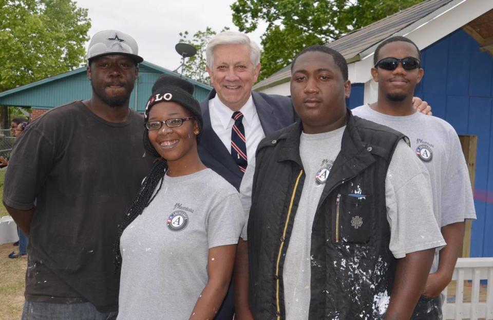 Mayor George Schloegel stands with YouthBuild volunteers Justin Lewis, Shamae Armstead, Jermill Peterson and Demar Moses at the groundbreaking of the Boys and Girls Clubs community garden.