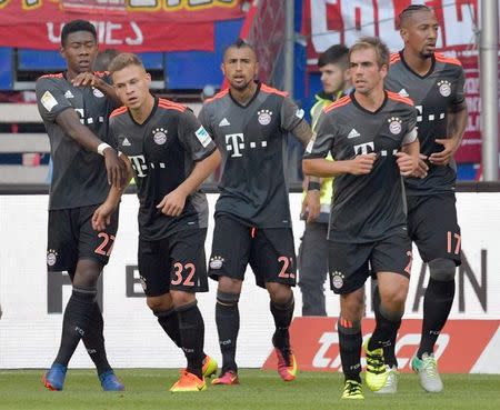 Football Soccer - HSV Hamburg v FC Bayern Munich - German Bundesliga - Volksparkstadion, Hamburg, Germany - 24/09/16 Bayern Munich's Joshua Kimmich celebrates with team mates. REUTERS/Fabian Bimmer