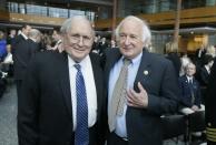 FILE - In this April 11, 2016 file photo, former U.S. Sen. Carl Levin, left, stands with his brother, Congressman Sander Levin before an unveiling of the USS Carl M. Levin during a ceremony in Detroit. Former Sen. Carl Levin, a powerful voice for the military during his career as Michigan’s longest-serving U.S. senator, has died. The Democrat was 87. Levin’s family says Levin died Thursday, July 29, 2021.(AP Photo/Carlos Osorio File)