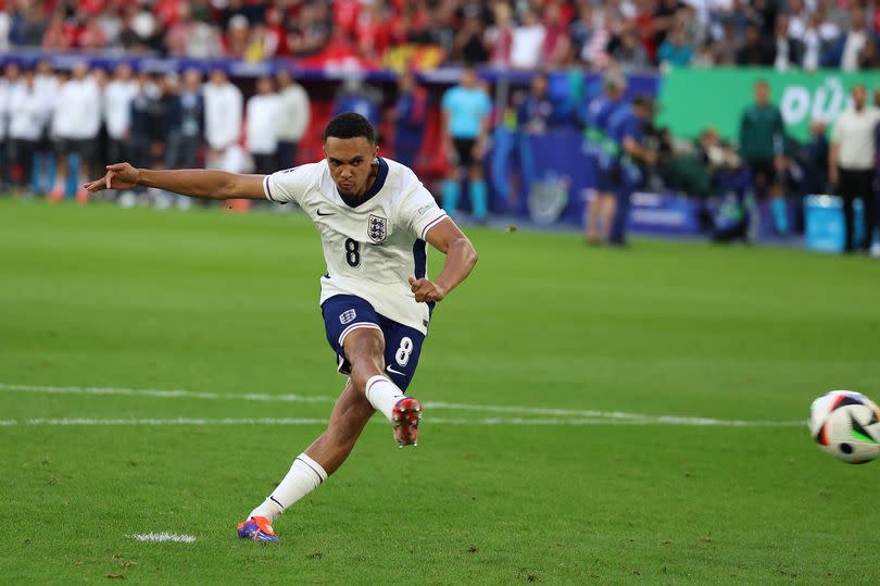 Trent Alexander-Arnold of England scores the winning penalty kick in the penalty shoot out during the UEFA EURO 2024 quarter-final match between England and Switzerland at Dusseldorf Arena on July 6, 2024 in Dusseldorf, Germany.