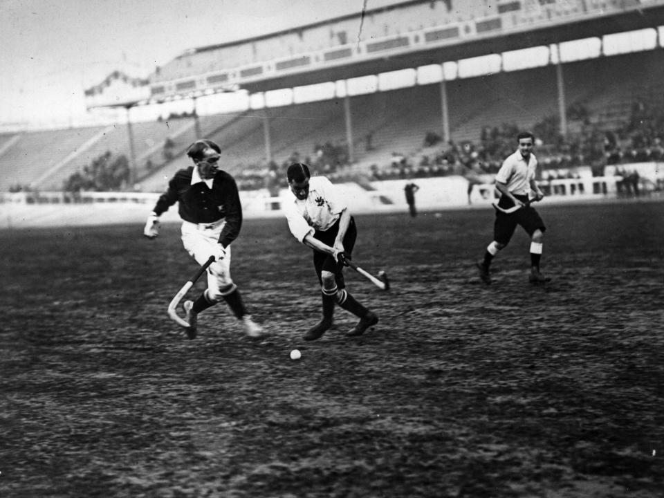 Black and white photos of three field hockey players in play at the 1908 Olympics