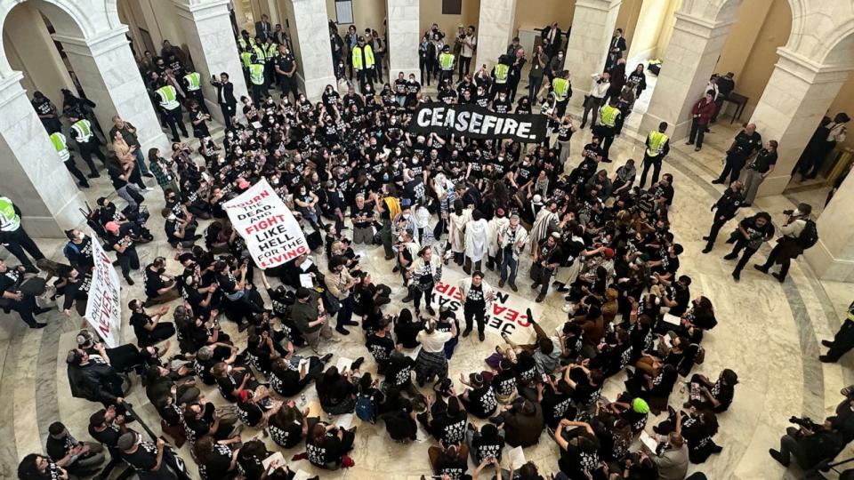 PHOTO: People demonstrate as they take part in civil disobedience and a protest calling for a ceasefire in Gaza inside the Cannon House office building in Washington, Oct. 18, 2023. (Jay O'Brien/ABC News)