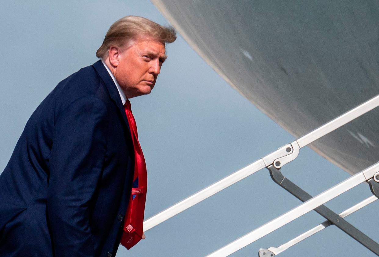 President Donald Trump in Florida on New Year’s Eve (AFP via Getty Images)