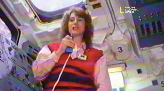 New Hampshire teacher Christa McAuliffe practices a lesson she planned to send down to kids from orbit in this screenshot from the National Geographic Channel's upcoming documentary "Challenger Disaster: Lost Tapes.”