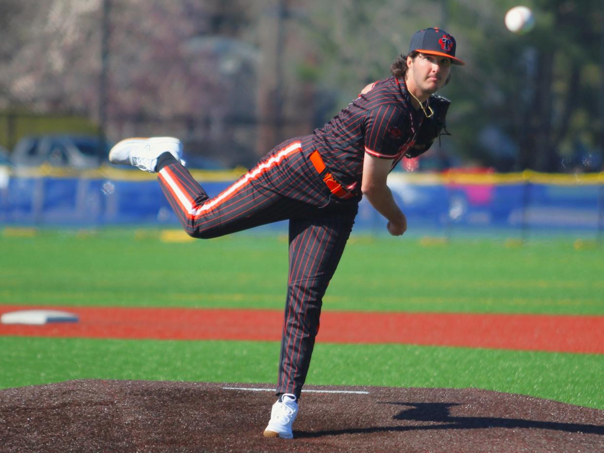 Taunton's Brady Morin tosses a pitch during a Hockomock League game against Attleboro.