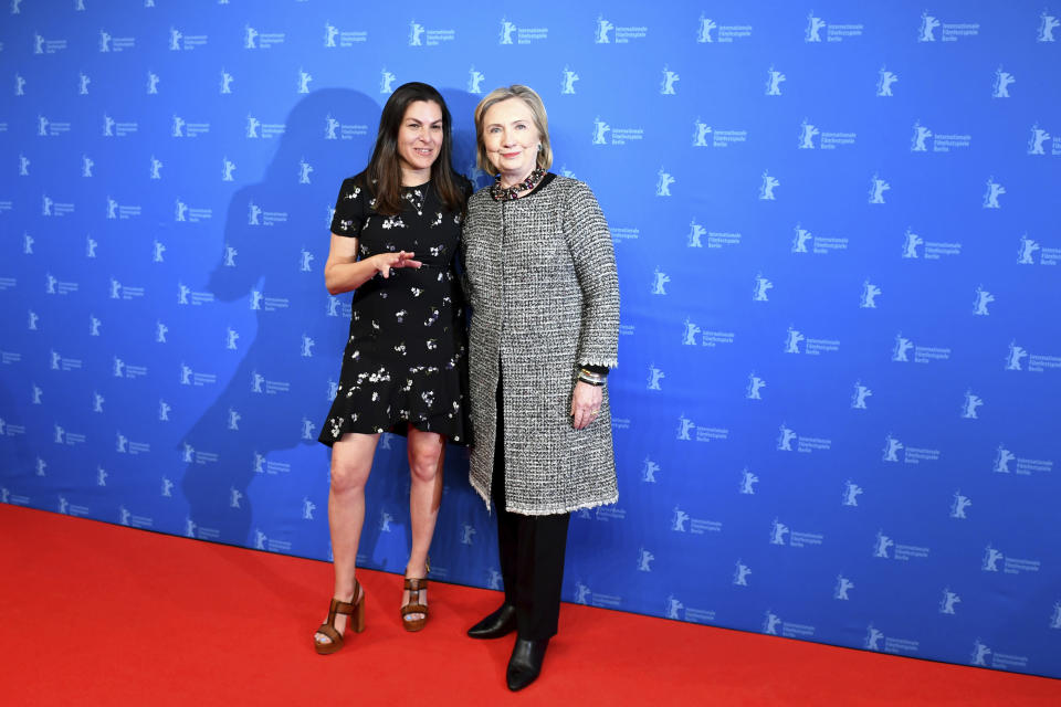 Former US Secretary of State, Hillary Clinton, right, and director Nanette Burstein pose for the photographers during photo-call for the film 'Hillary' at at the 70th International Film Festival Berlin, Berlinale in Berlin, Germany, Monday, Feb. 24, 2020. ( Jens Kalaene/dpa via AP)