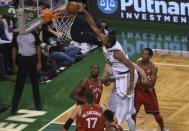 Nov 12, 2017; Boston, MA, USA; Boston Celtics forward Al Horford (42) dunks the ball past Toronto Raptors guard DeMar DeRozan (10) during the first half at TD Garden. Bob DeChiara-USA TODAY Sports