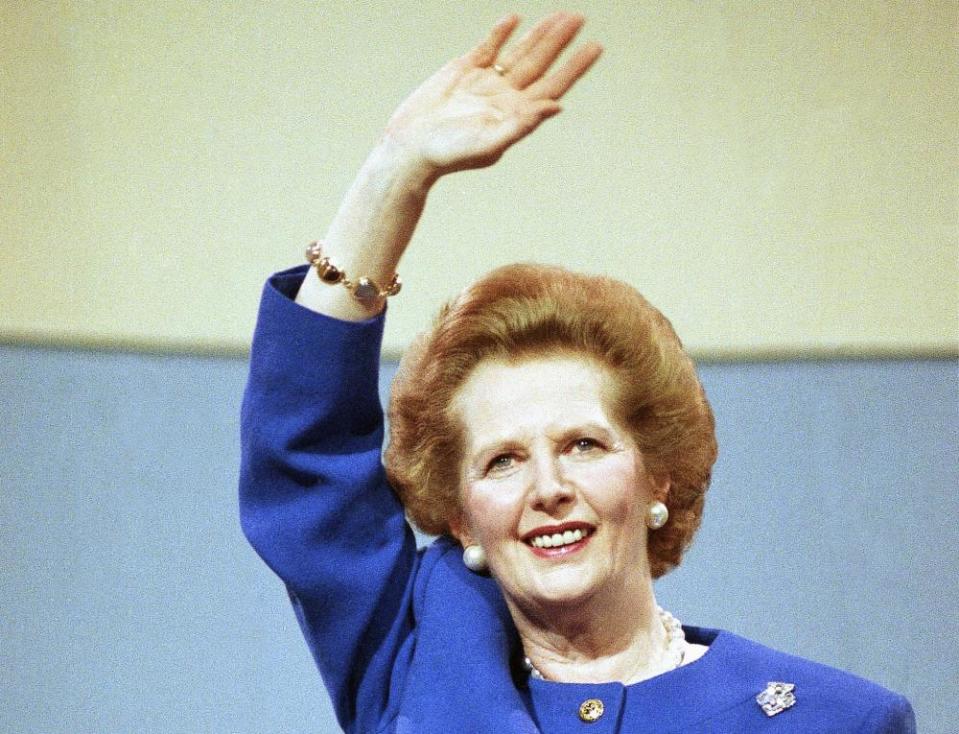 Late prime minister Margaret Thatcher waving to delegates at the Conservative Party Conference in Brighton, England, Oct. 14, 1988