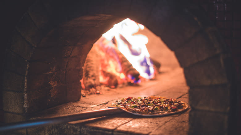 Pizza in woodfired stone oven