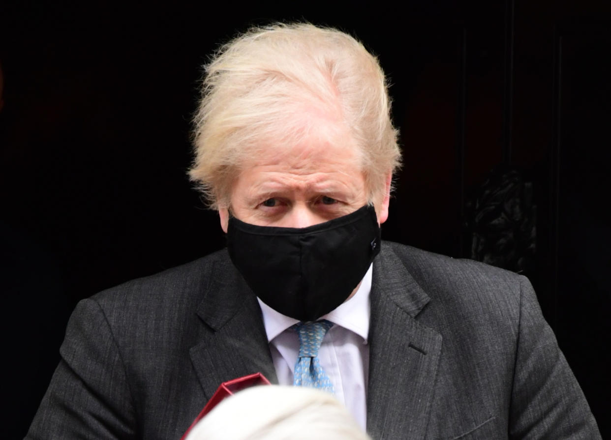 Prime Minister Boris Johnson leaves 10 Downing Street to attend Prime Minister's Questions at the Houses of Parliament, London. Picture date: Wednesday February 10, 2021. (Photo by Ian West/PA Images via Getty Images)