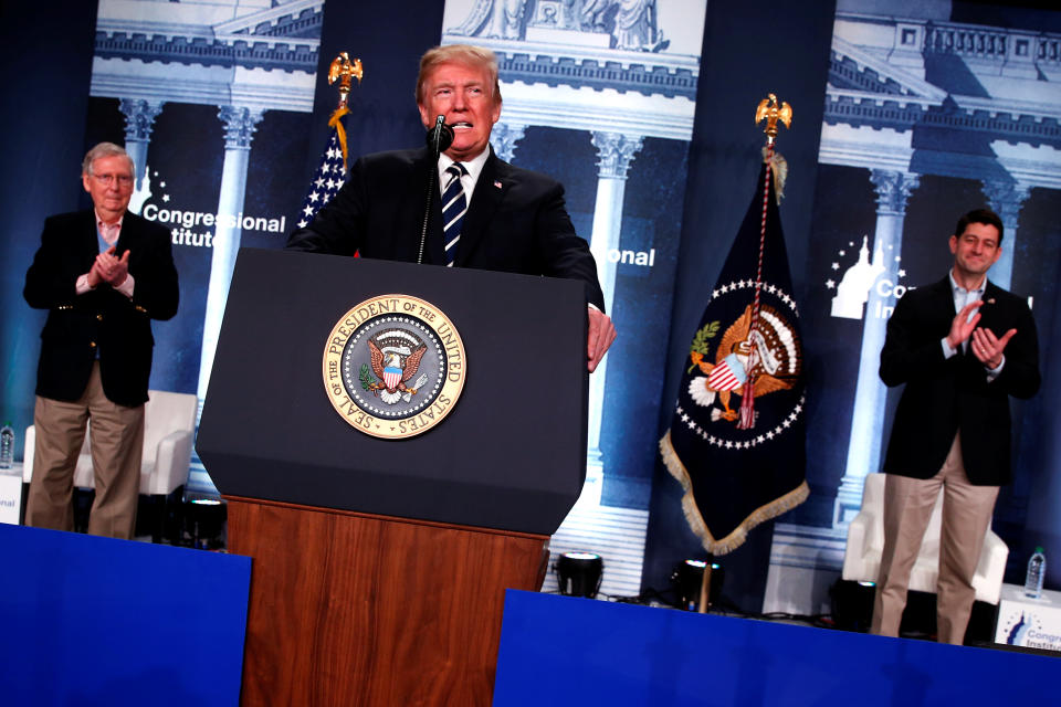 President Trump, flanked by Senate Majority Leader Mitch McConnell, R-Ky., left, and House Speaker Paul Ryan, R-Wis., addresses the Republican congressional retreat at the Greenbrier resort in White Sulphur Springs, W.Va., Feb. 1, 2018. (Photo: Jonathan Ernst/Reuters)