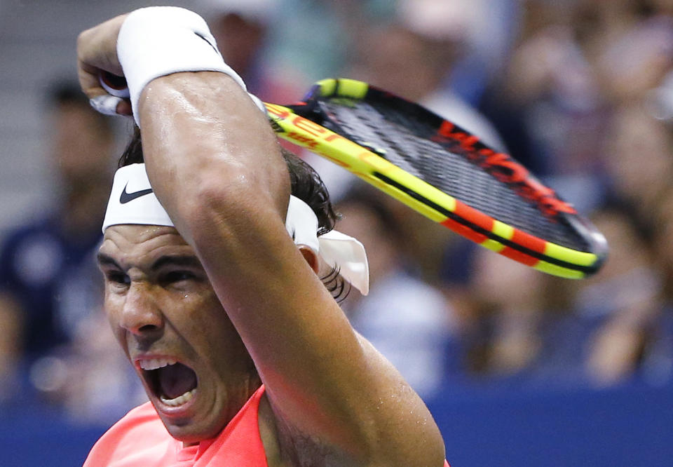 Rafael Nadal, of Spain, returns a shot to Karen Khachanov, of Russia, during the third round of the U.S. Open tennis tournament, Friday, Aug. 31, 2018, in New York. (AP Photo/Jason DeCrow)