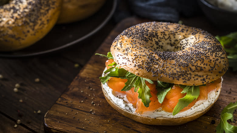 Bagel with salmon and arugula