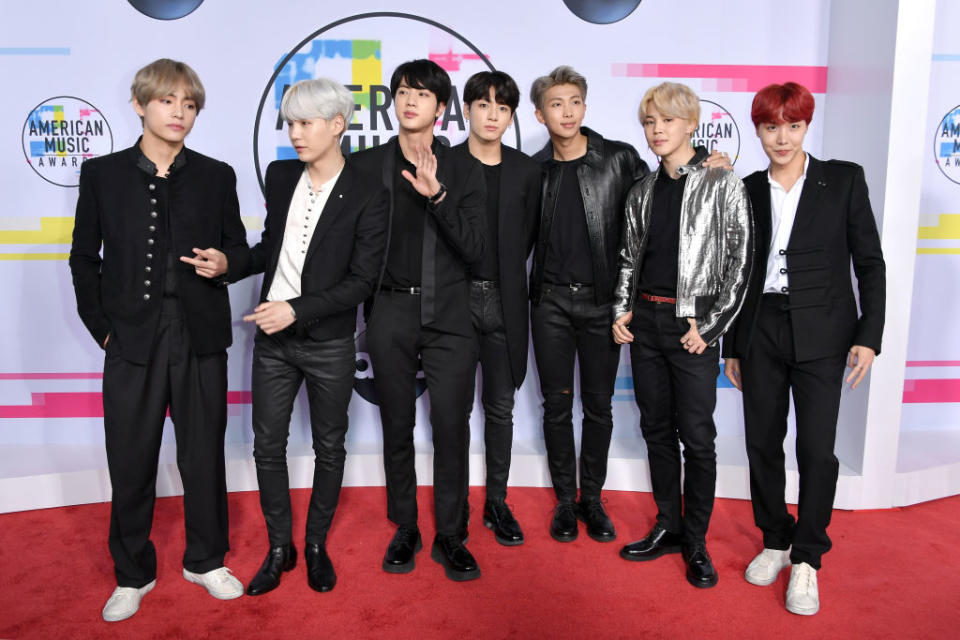 K-Pop group BTS striking a pose on the red carpet