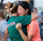 <p>Friends and family attend a vigil held at the First Bank in Santa Fe for the victims of a shooting incident at Santa Fe High School where a shooter killed at least 10 students on May 18, 2018 in Santa Fe, Texas. (Photo: Bob Levey/Getty Images) </p>