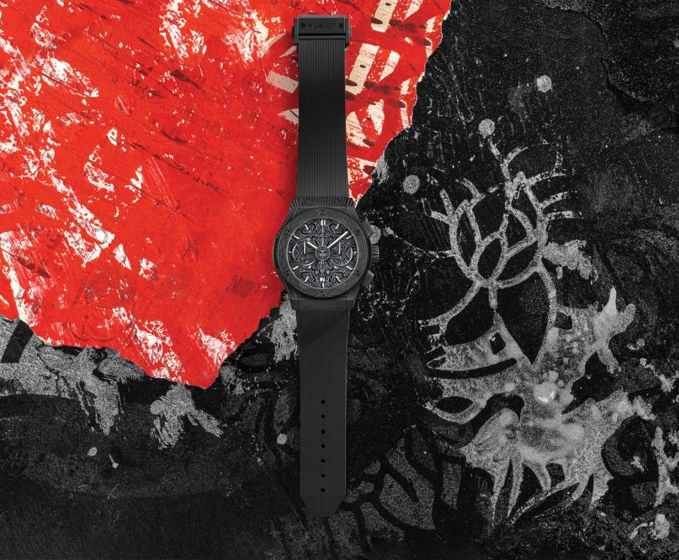 Hublot-Classic-Fusion-Aerofusion-Chronograph-All-Black-Shepard-Fairey laying on a black and red background