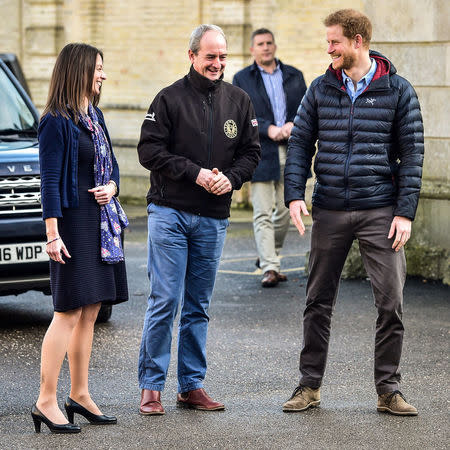 Prince Harry meets Director of Recovery David Richmond and CEO Melanie Waters during a visit to a Help For Heroes Recovery Centre at Tedworth House, where he learnt more about the mental health support military veterans are receiving, in Tidworth, Wiltshire, Britain January 23, 2017. REUTERS/Ben Birchall/Pool