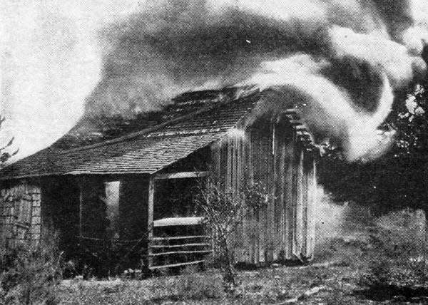 Deliberate burning of an African American home in Rosewood, Florida, on January 4, 1923.