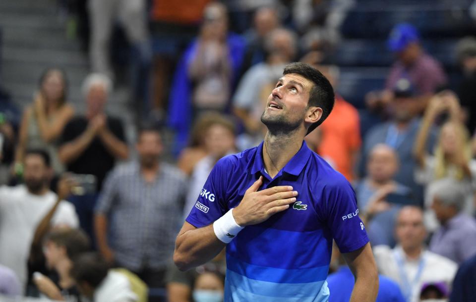 Pictured here, Serbia's Novak Djokovic celebrates his US Open quarter-final victory.